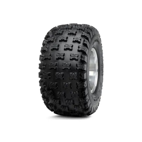 Black off-road tire with prominent tread pattern on a white background
