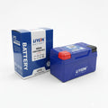 Blue battery with red top and matching box on a white background