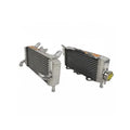 Two metal radiators on a white background