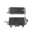 Two metal radiators on a white background