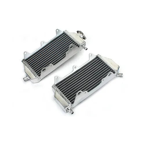 Two metal radiators on a white background