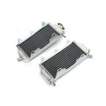 Two metal radiators on a white background