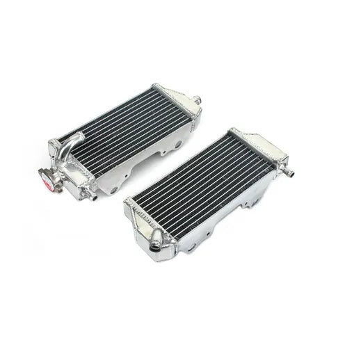 Two metal radiators on a white background