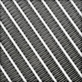Close-up of a grid with cylindrical elements