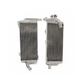 Two metal radiators on a white background