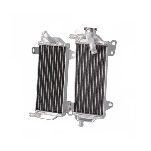 Two metal radiators side by side on a white background