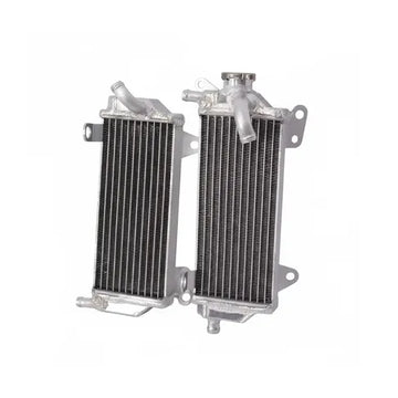 Two metal radiators side by side on a white background