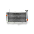 Metal radiator with orange bolts on a white background