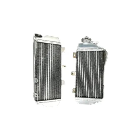 Two silver metal radiators on a white background