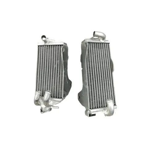 Two silver metal radiators on a white background