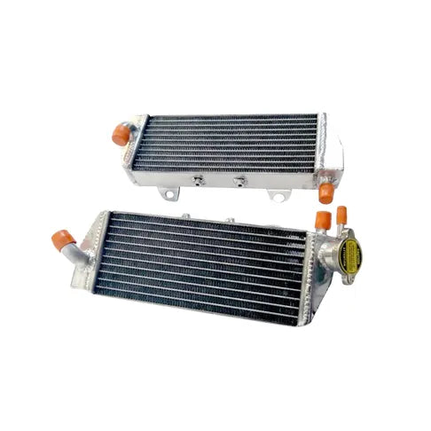 Two metal radiators with orange bolts on a white background