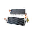 Two automotive radiators on a white background