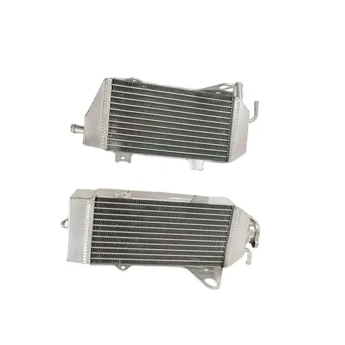 Two metal radiators on a white background