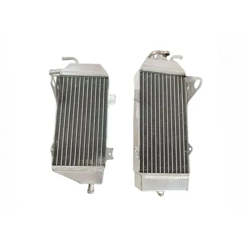 Two metal radiators on a white background