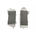Two metal radiators on a white background