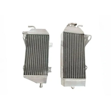 Two metal radiators on a white background