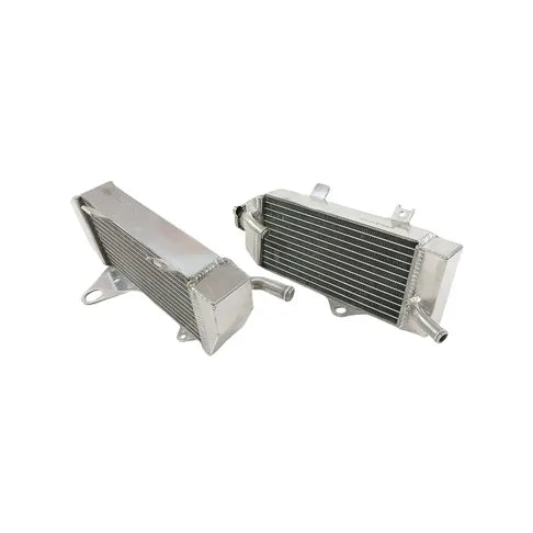 Two metal radiators on a white background