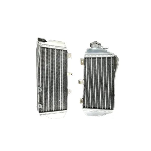Two silver metal radiators on a white background