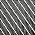 Close-up of a grid with cylindrical elements