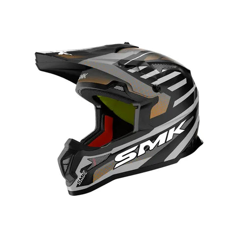 Black and gray motocross helmet with SMK branding on a white background