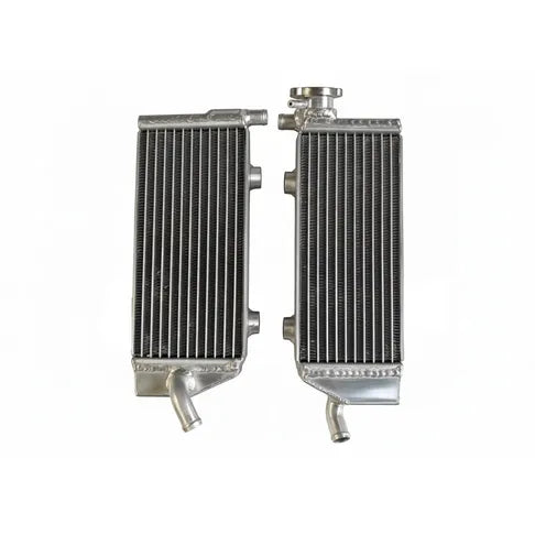 Two metal radiators side by side on a white background
